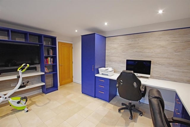 Two desks are fitted within this flexible space utilised as a home office.