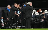 Coach Graeme Jones (left) reportedly had a confrontation with Newcastle striker Dwight Gayle.