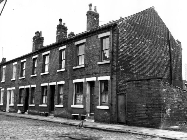 Ashfield Street in August 1967. This view is from the waste ground, locally known as 'Buggy Park'.