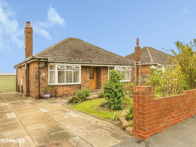 This charming bungalow, on Upper Lane, is currently available for £275,000 through estate agents Purplebricks .