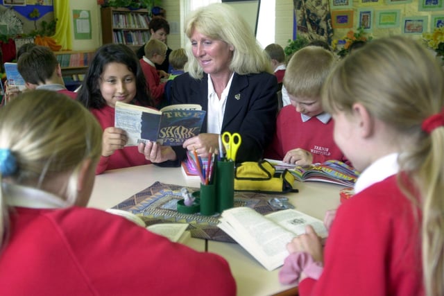 Acting headteacher, Andrea Eddison, with pupils at Westfield Junior School which was praised for its achievements in June 2001.