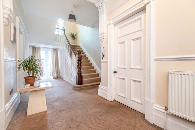 The French doors in the entrance hallway lead to the rear garden and there is also understairs storage.