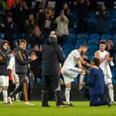 FOND FAREWELL - Leeds United midfielder Mateusz Klich was saluted by director of football Victor Orta as he walked off the Elland Road pitch for the last time. Pic: Bruce Rollinson