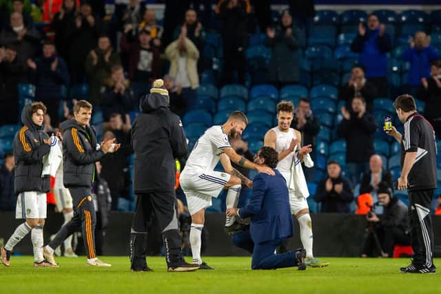 FOND FAREWELL - Leeds United midfielder Mateusz Klich was saluted by director of football Victor Orta as he walked off the Elland Road pitch for the last time. Pic: Bruce Rollinson