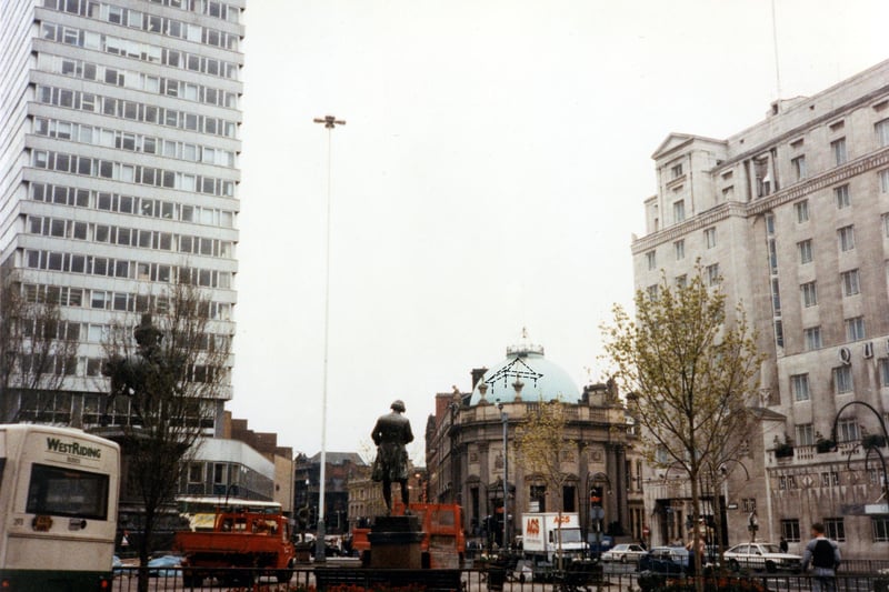 The statues of Joseph Priestley and the Black Prince can be seen in this photo from April 1990. The tall building on the left is Royal Exchange House; in the centre with the domed roof is the Observatory wine bar, formerly the Midland Bank. On the right is the Queen's Hotel.
