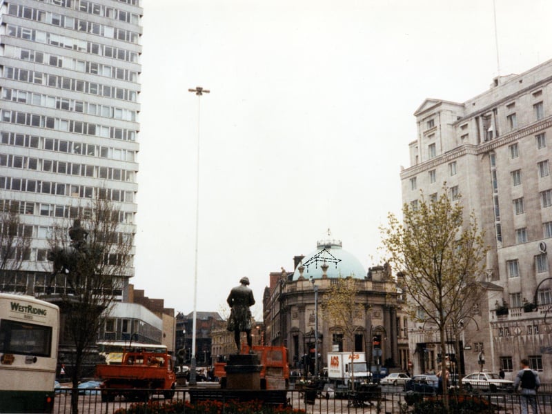 The statues of Joseph Priestley and the Black Prince can be seen in this photo from April 1990. The tall building on the left is Royal Exchange House; in the centre with the domed roof is the Observatory wine bar, formerly the Midland Bank. On the right is the Queen's Hotel.
