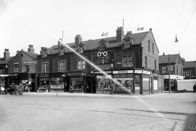 Harehills Lane in September 1935. In focus are number 355 Singer Sewing Machine Co. Ltd. Number 357 Meadow Dairy Co. Ltd. Number 359 Hartley, Wm Thomas Greengrocer, Hartleys Fruit market, number 361 Woodhead, Eric Confectioner, number 363 Stephenson, George butcher, number 365 Hirst, Norman chemist, Number 367 Lewis's shoeshop Foundry Lane now called Foundry Approach