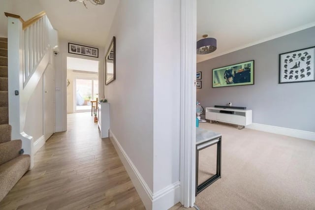 The home is presented to an incredibly high standard throughout, with a welcoming entrance hall which has an understairs cupboard which is great for storage