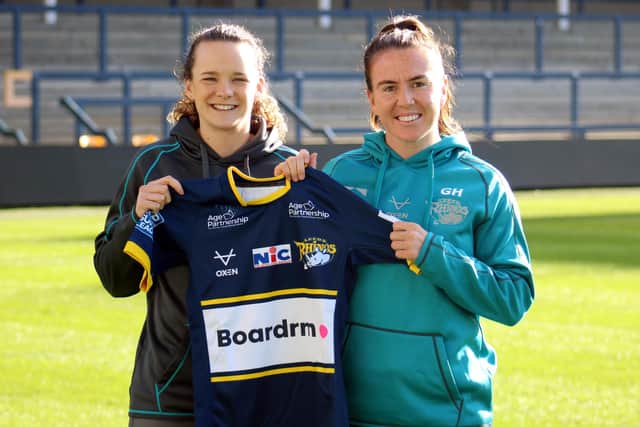 Sam Lisone's partner Georgia Hale, pictured right with coach Lois Forsell, is set to make her Rhinos debut on Sunday. Picture by Leanne Flynn/Leeds Rhinos.