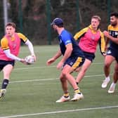 Corey Johnson, seen in training, is competing with fellow hookers Andy Ackers and Jarrod O'Connor for a place in Rhinos' 17 this year. Picture by Simon Hulme.