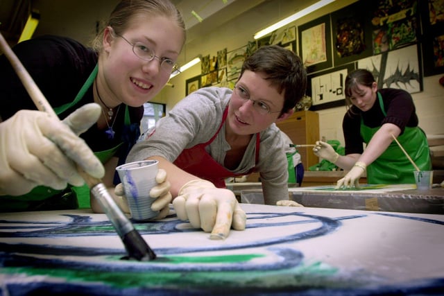 Morley High School artist in resident Dionne Swift works with sixth form pupils Sarah Foxwell (left) and Cara Dobson in February 2002.
