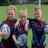 Triplets Harrison, Leo and Xander Oliver who will celebrate their 10th birthday by playing together for Guiseley Rangers on the Headingley pitch at half-time of Leeds Rhinos' Super League clash with St Helens. Picture by Rose Oliver.