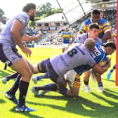 Leeds Rhinos are a better team with Cameron Smith - seen scoring his second try against Warrington Wolves - on the pitch, according to fan Tom Goldsworthy. Picture by Steve Riding.