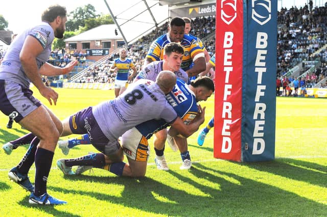 Leeds Rhinos are a better team with Cameron Smith - seen scoring his second try against Warrington Wolves - on the pitch, according to fan Tom Goldsworthy. Picture by Steve Riding.