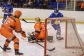 SHeffield Steeldogs v Leeds KnightsKnights Finley Bradon scores the first goal past net minder Brady Parker.Photograph by Tony Johnson.  31st December 2025.