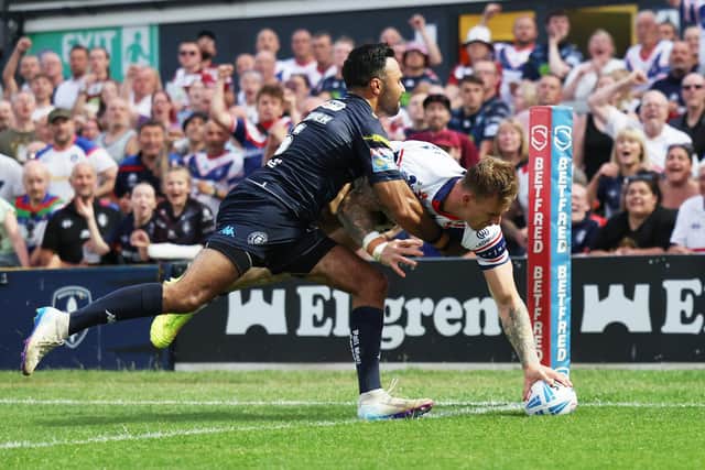 Tom Johnstone scores for Wakefield Trinity in last week's defeat of Wigan Warriors. Picture by John Clifton/SWpix.com.