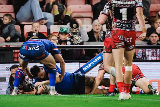 Cameron Scott scores for Wakefield Trinity during last week's win at Leigh Leopards. Picture by Alex Whitehead/SWpix.com.