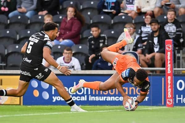 Derrell Olpherts scores a spectacular try for Castleford at Hull FC last season. Picture by Will Palmer/SWpix.com.