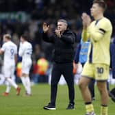 WHITES PREDICTION: From Preston boss Ryan Lowe, centre, pictured applauding his side's fans after Sunday's 2-1 defeat against Championship hosts Leeds United at Elland Road. Photo by Nigel French/PA Wire.