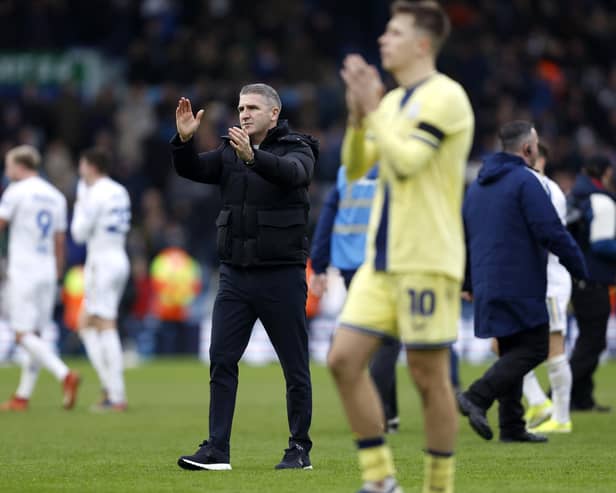 WHITES PREDICTION: From Preston boss Ryan Lowe, centre, pictured applauding his side's fans after Sunday's 2-1 defeat against Championship hosts Leeds United at Elland Road. Photo by Nigel French/PA Wire.