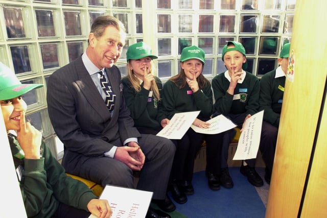 Prince Charles meets children taking part in a sponsored silence at The Robert Ogden Macmillan Cancer Information Centre, Leeds, on February 9, 2001.