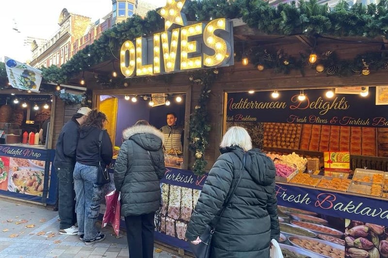 This stall, located on Lands Lane, serves Mediterranean delights including fresh olives.