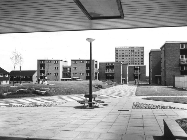 A view from Ash Tree Grange, a block of high rise flats on the Swarcliffe estate. Various examples of council housing are visible including houses, maisonettes and tower blocks. Ash Tree Grange was built to a height of 36 metres on 12 floors in 1965.