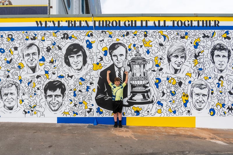 The artwork was unveiled to pay tribute to the 50th anniversary of Leeds United's 1972 FA Cup-winning side. It depicts squad members around legendary manager Whites boss Don Revie A. It was painted by Nicolas Dixon and sports artist Paul Trevillion, at Lowfields Road near Elland Road.