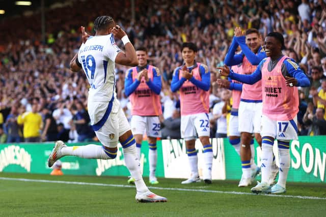 NEW BOYS: Ao Tanaka, third from right, and Largie Ramazani, right, applaud the 'perfect' finish from Mateo Joseph to put Leeds United ahead. Photo by Cameron Smith/Getty Images.