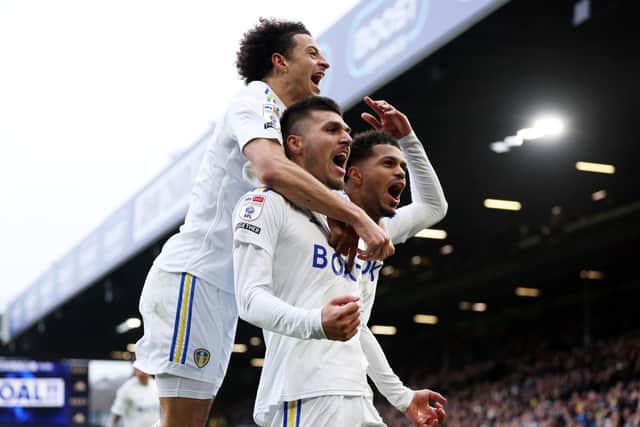 AMBITION: Declared by Leeds United midfielder Ethan Ampadu, left, pictured celebrating with goalscorer Joel Piroe, centre, and Georginio Rutter, right, after Piroe's strike put the Whites 4-0 up in Saturday's Championship romp against Ipswich Town at Elland Road. Photo by George Wood/Getty Images.