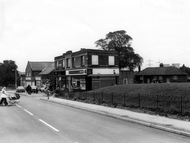 A parade of shops on Raynville Road in April 1979 that include a Co-op, a hair stylist and a Spar on the far right.