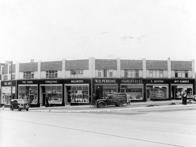 Parade of shops at junction of Stainbeck Lane and Harrogate Road in July 1939. Shops, from left, are Fred Smith, electrical engineer, The Cabin, Yorkshams, butchers, wallwork, ladies outfitter, W D Perkins, confectioners, Hargreaves, Coal Merchants, A Benton, shoeshop and Miss Kimber, ladies hairdressers.