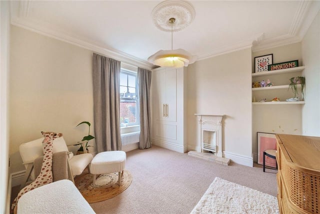 There are two elegantly proportioned double bedrooms, both with built in storage spaces and a feature fireplace.