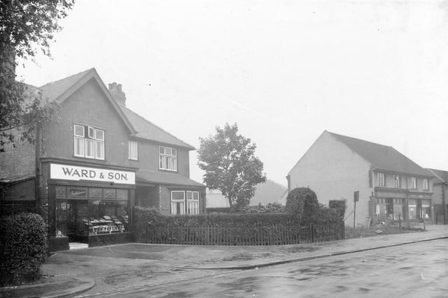 Shops on the south side of Dib Lane, Wards and Son, confectioners in the foreground. Pictured in July 1936.