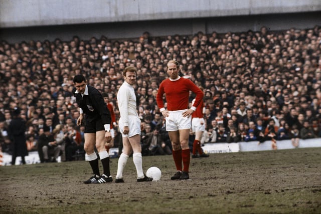 Billy Bremner (centre) of Leeds United and Bobby Charlton of Manchester United (right), with referee Jack Taylor.  (Photo by A. Jones/Express/Getty Images)
