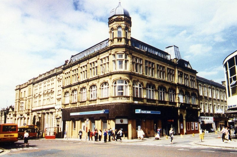 February 1995 and in focus is the 1899 building of the Morley Industrial Co-operative Society, occupied by Barclays Bank at the time , at the junction of Queen Street and Albion Street. Just visible on the right is part of the 1957 Co-op building, known as Society House.