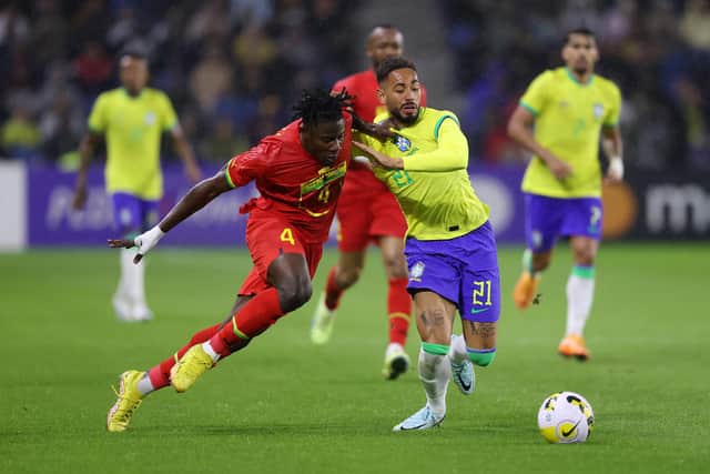LE HAVRE, FRANCE - SEPTEMBER 23: Mohammed Salisu of Ghana battles for possession with Matheus Cunha of Brazil during the International Friendly match between Brazil and Ghana at Stade Oceane on September 23, 2022 in Le Havre, France. (Photo by Dean Mouhtaropoulos/Getty Images)