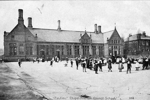 A postcard with a postmark of April 22, 1905 showing playtime at Chapel Allerton Council School. Pupils are playing here in the large playground at the front of the school, many of them gathered in a circle for activities with three members of staff.
