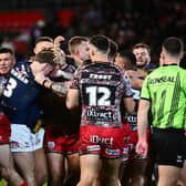 Leeds Rhinos' Harry Newman and Matt Davis, of Leigh Leopards, were sin-binned following a skirmish during Friday's Betfred Super League round one clash. Picture by Olly Hassell/SWpix.com.