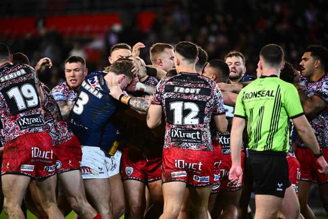 Leeds Rhinos' Harry Newman and Matt Davis, of Leigh Leopards, were sin-binned following a skirmish during Friday's Betfred Super League round one clash. Picture by Olly Hassell/SWpix.com.