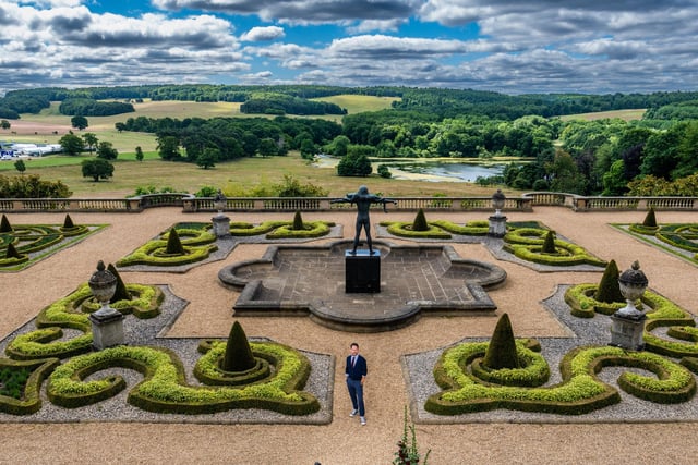 The view out across the estate from the terraces at Harewood House is hard to beat. Pictured in the gardens is designer Alistair Baldwin.
