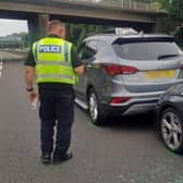 John Barlow's Hyundai car (left) that stopped an Audi on the outside lane of the M62 near Leeds after the Audi driver suffered a suspected seizure. PIC: John Barlow/PA Wire
