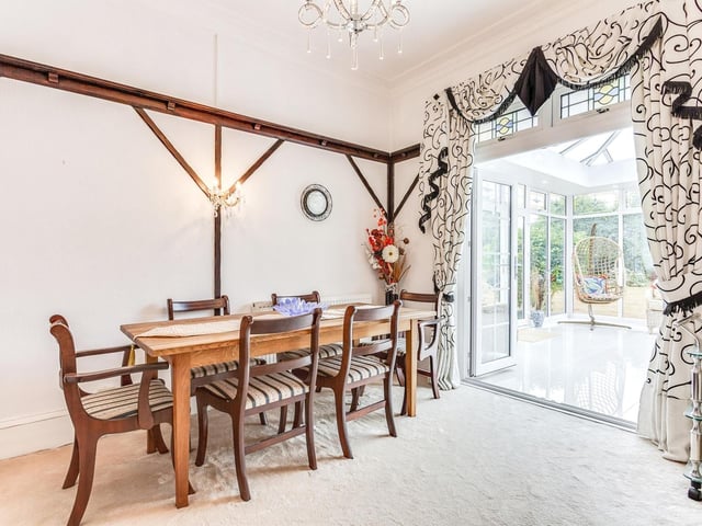 The ground floor dining room that opens through to the conservatory