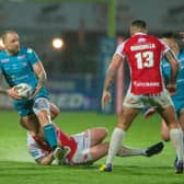 Rhinos' Blake Austin is tackled by James Batchelor of Hull KR during the sides' meeting at Sewell Group Craven Park in March. Both players are set to return for Friday's rematch.  Picture by Bruce Rollinson.