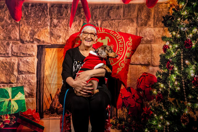 Leena and pup Archie were among hundreds to celebrate at the Christmas party for Dachshund enthusiasts.