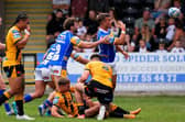 Presley Cassell celebrates scoring his first Leeds Rhinos try in the 64-6 win at Castleford Tigers. Picture by Olly Hassell/SWpix.com.