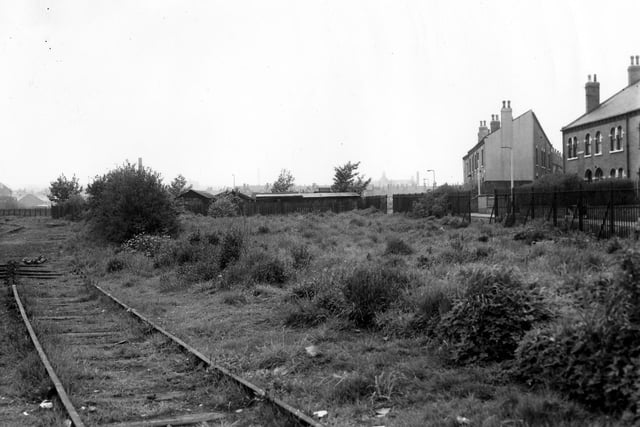 A section of Middleton Railway in view with Prospect Terrace on the right. This stretch was part of the Midland Railway (the passenger line for Leeds)and the stretch of track shown is part of this spur. Considered to be the oldest railway in the world the Middleton line was the result of Charles Brandling's attempt to transport coal from Middleton Colliery to Leeds as quickly and cheaply as possible. Pictured in May 1968.