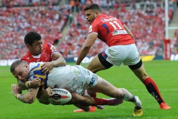 Brad Singleton powers over to score for Leeds Rhinos during their 2014 Challenge Cup final win against Hull KR at Wembley. Picture by Steve Riding.