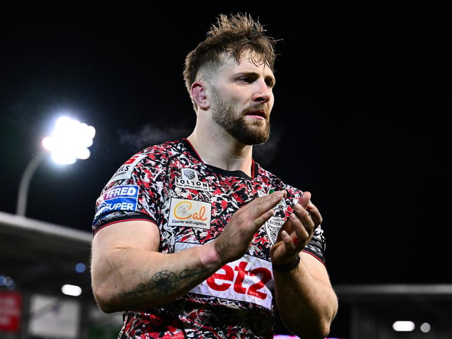 Grade A late contact on passer, one penalty point, total points 1.75 - no further action.