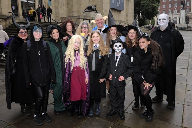 Halloween characters from the CluedUpp game of Witchcraft and Wizardry Murder by Magic where participants had to solve a murder mystery by using their phones as they hunt round Leeds city centre. Pictured are some of the groups gathered on The Headrow